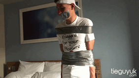tieguyuk:  Sometimes, all you need is a roll of duct tape. From todays awesome update, members can check out Dex all taped up courtesy of kinkyladnextdoor. 