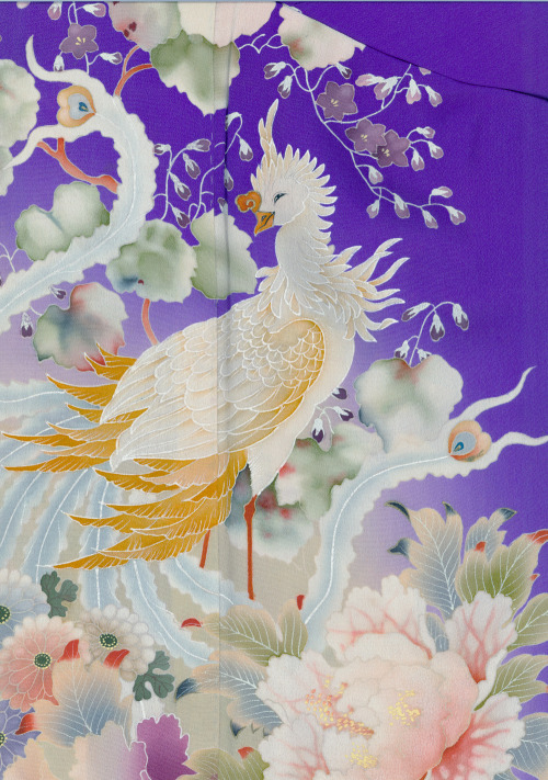 A refined blue kinsha-silk irotomesode featuring yuzen-dyed phoenix and flower patterns with hand-pa