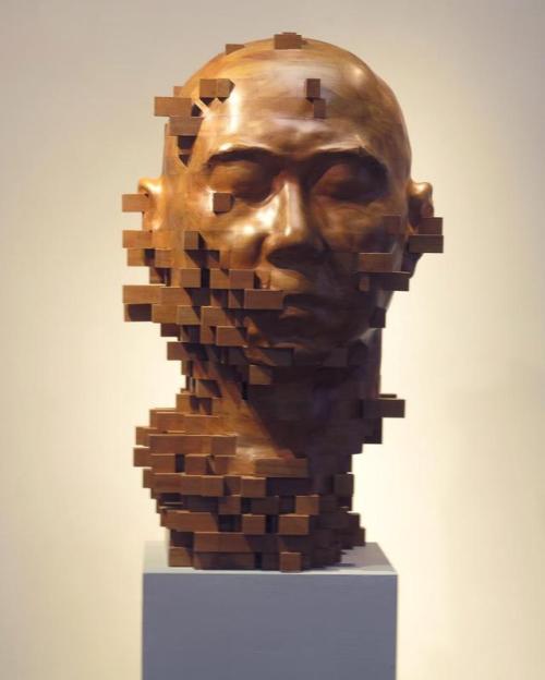 nowheresheepdog:  littlelimpstiff14u2: Pixelated Wood Sculptures Carved by Hsu Tung Han In a clash of digital and analogue, artist Hsu Tung Han  carves figurative sculptures from wood that appear to be dissolving  into fields of pixels. The Taiwanese