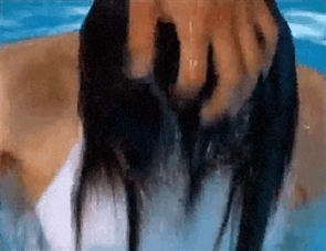 Women Blowing Bubbles Underwater