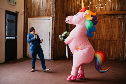  Michelle surprised Amie in a blow up unicorn suit for their first look. Then Amie “unwrapped&