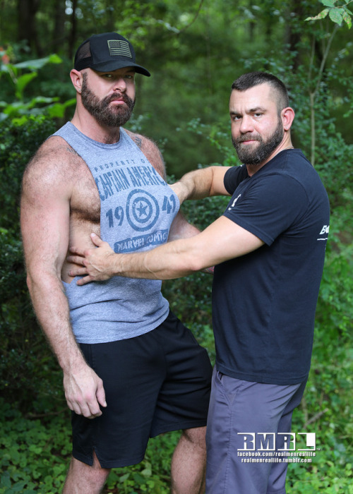 Chris & Cody help each other into their pool attire.