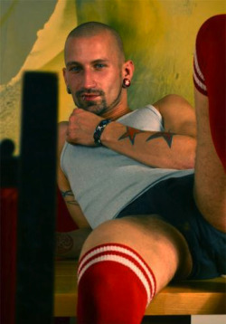 bootslaveboyusa:  Hot soccer socks on a hot guy. Love when guys pull ‘em up past their knees 