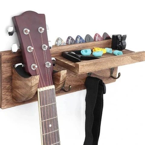 Multi-in-one design: this wooden guitar wall hanger is not only a guitar bracket but also a good storage rack. It can hold the guitar paddles, shoulder straps, tuner, guitar clip, and other guitar accessories on one shelf in order to save...