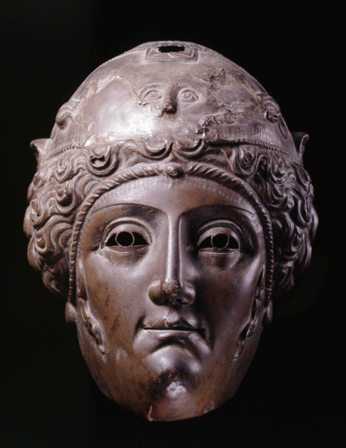 armthearmour: A fantastic Roman bronze Parade Helmet with the face of a woman, possibly worn by sold