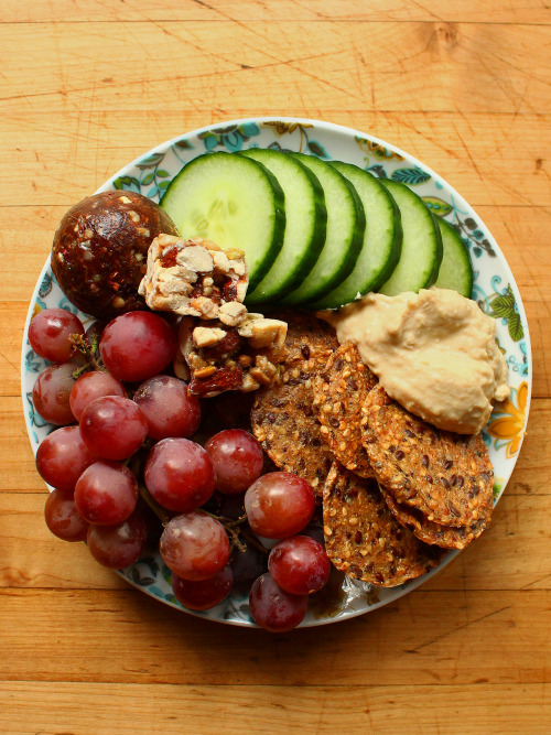 garden-of-vegan:  Cucumber slices, roasted garlic hummus, and Mary’s crackers. Grapes, pistachio-almond clusters, and a brownie ball (dates, walnuts, cocoa, cacao nibs, hemp hearts, chocolate chips, and coconut oil.)