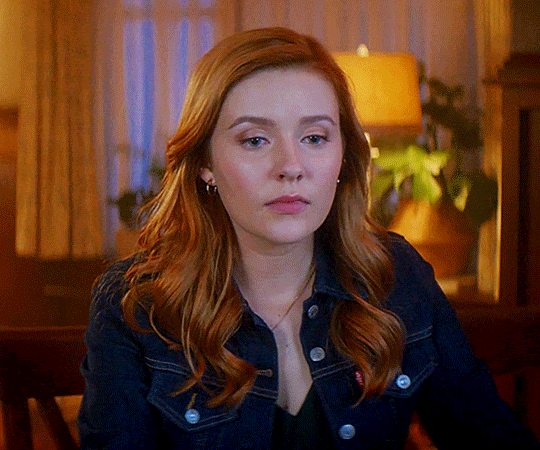 GIF FROM EPISODE 1X07 OF NANCY DREW. NANCY IS SITTING AT THE DINING TABLE IN HER HOUSE. SHE HAS A DISTANT LOOK ON HER FACE. SHE TAKES A BREATH, THEN TURNS HER GAZE TO SOMEONE OUT OF FRAME. SHE SAYS "DID YOU KILL LUCY SABLE?"