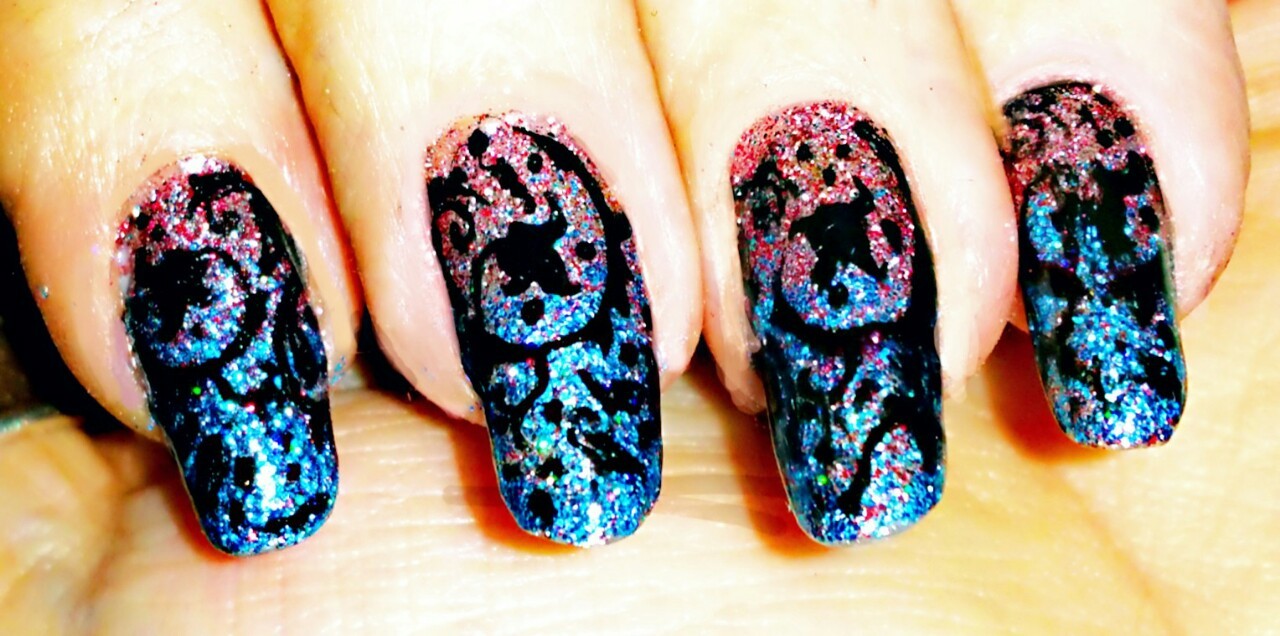 nailpornography:  Rose Quartz inspired glitter gradient with a a scrollwork stamp