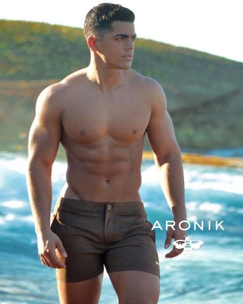 frickssexyfashion:  Jay Torres’ Sexy Muscular Body is showcased perfectly by the Scout Expresso shorts by @aronikswim Your trained legs will look just like Jays, encased perfectly in these 100% Polyester short, which are perfect for the beach. Forget