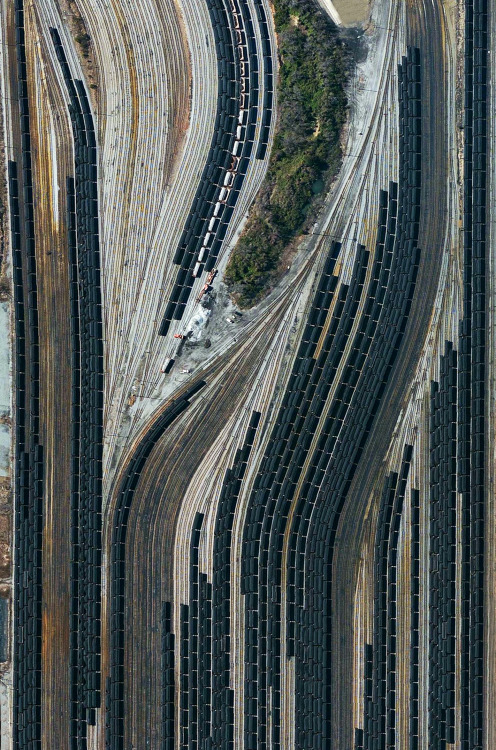 dailyoverview: Train cars filled with coal are stationed in Norfolk, Virginia. Operated by the Norf