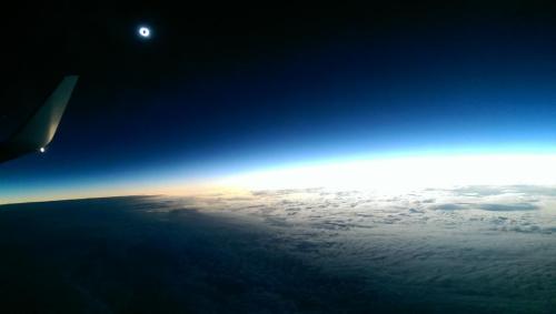 Maginificent photo of the solar eclipse from a plane js