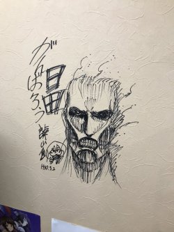 snknews: Isayama Hajime Visits Local Anime Store and Contributes New Colossal Titan Sketch The Hita city anime store Ota-Base tweeted about Isayama Hajime’s recent visit as well as the Colossal Titan (And chibi Mikasa) he drew on the store wall! The