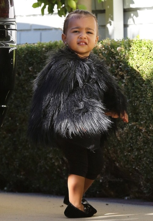 yeezusbound2:Kim and North arriving at a friends house in Beverly Hills.(11/28/14)