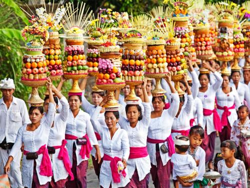 Gebogan is the name of the tall offerings made by Balinese women to the Gods in the temples during f