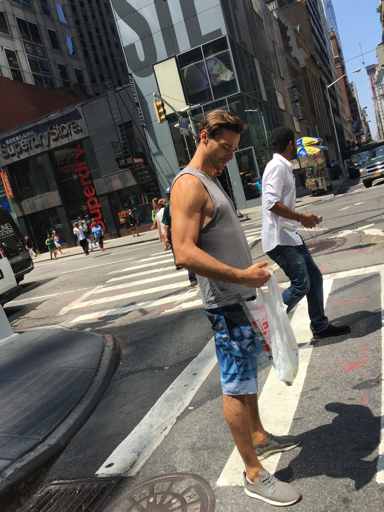 nychotguys:  Tank Top Hottie on Lexington Ave. NYC.Thanks EverydayHotness!