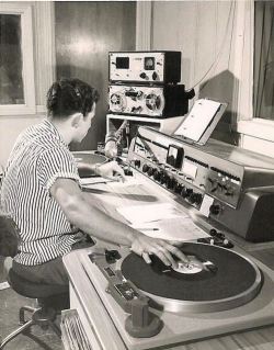 theniftyfifties:  A disc jockey at work in