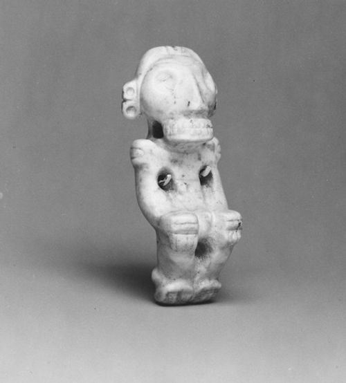 Taíno stone pendant (La Caleta [?], Dominican Republic, 13th– 15th century).  Approximately 7.6cm hi