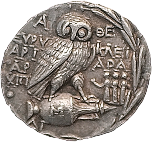 Silver Athenian tetradrachm in the “new style,” depicting an owl standing atop a Pa