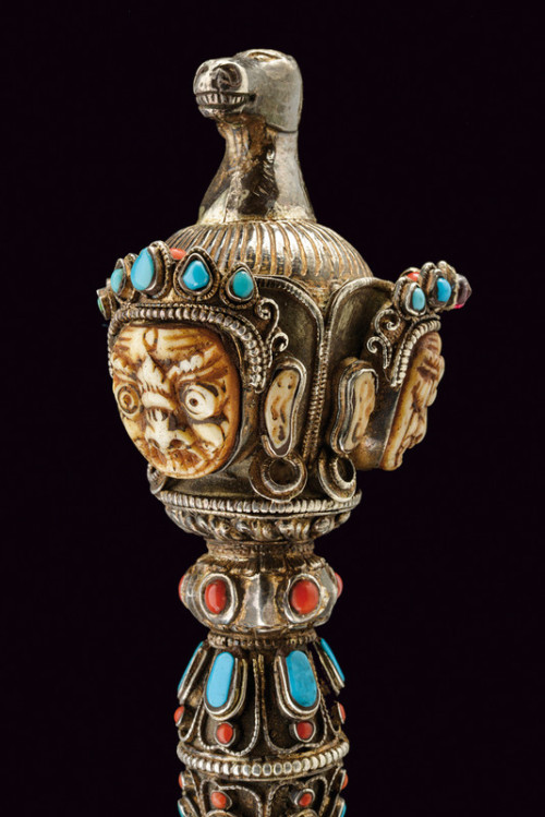 Tibetan phurbu decorated with silver, red coral, and turquoise, late 19th century.from Czerny’s Inte