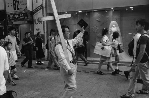 globalchristendom: A Protestant evangelist in the Myongdong district of Seoul, South Korea. (Photogr