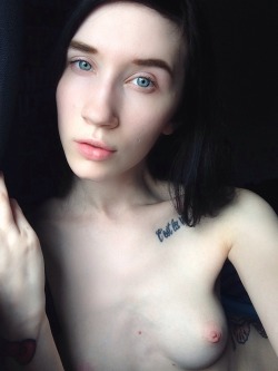 gypsyrose27:  Sitting in front of my window topless because I can.  Cute