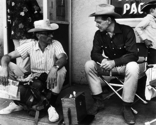 Arthur Miller talks with Clark Gable on the set of The Misfits, 1960.