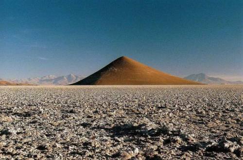 El Cono de AritaRising up out of the barren salt plain of the Salar de Arizaro in Argentina&rsquo;s 