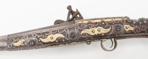 Ornate bone and silver mounted snaphaunce musket originating from North Africa, 19th century.