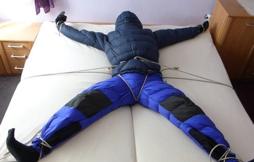 get tied on bed with two down jackets (one normal, one backwards) and my down pants. All three are f