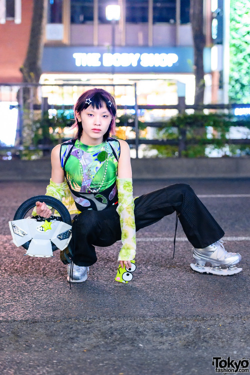 14-year-old Japanese street style personality Raiki on the street in Harajuku wearing a harness by S