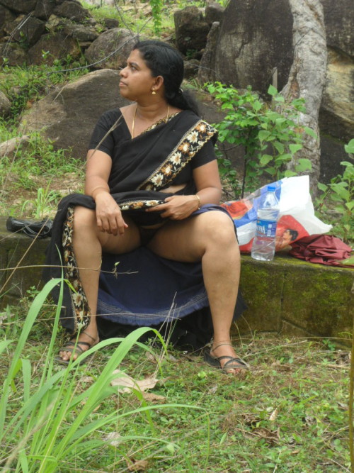 iloveindianwomen:  Desi Maid in Yellow Saree Loves to Show Her Cunt. For Full sets go here and here   The last pic is another up-saree pic