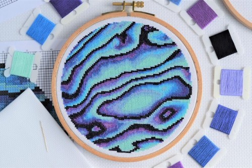 A Paua Shell cross stitch in a 6-inch hoop.