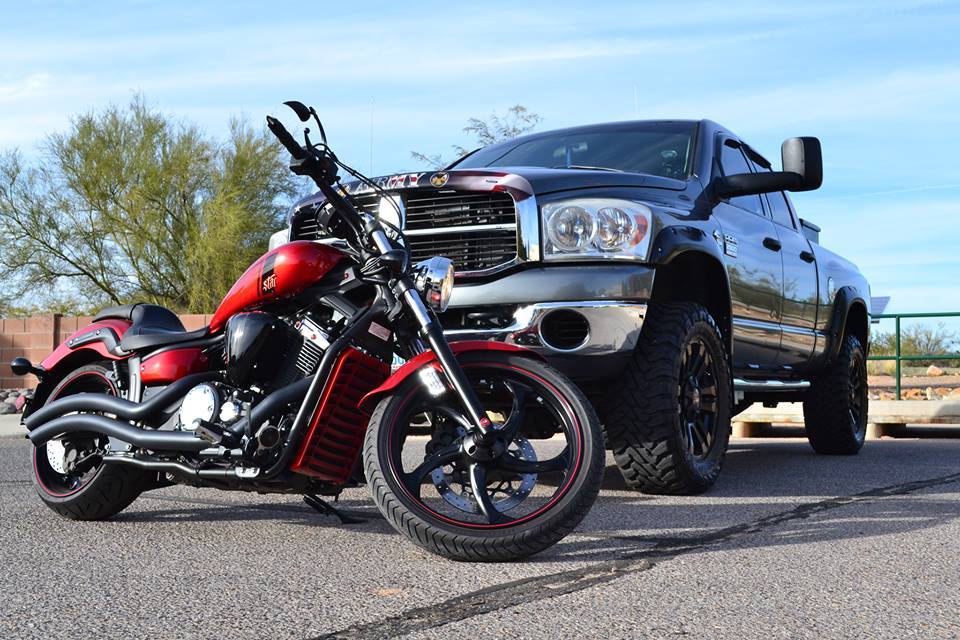 cummins-trucks:   My two loves in my life. My bike, and my 5.9 Cummins 700 HP Corvette