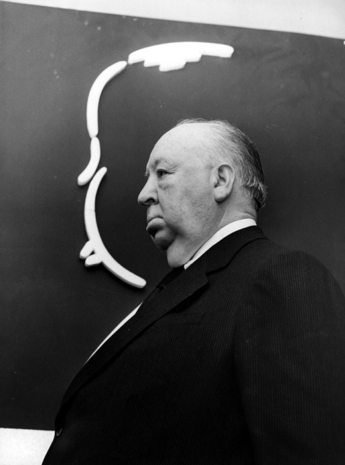 sixtiescircus:  Alfred Hitchcock  With his signature self caricature.