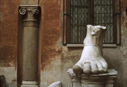la-femme-terrible:Pieces of statue of Constantine I in front of the Palace of the Conservator, on Ca
