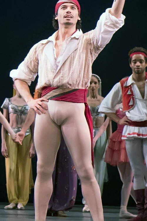 male dancer in white tights