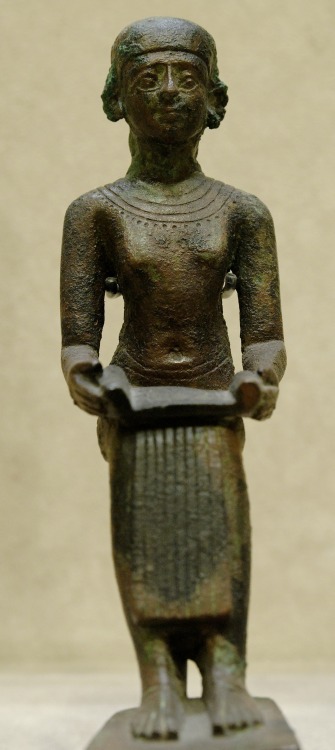 Bronze figurine of the 3rd Dynasty architect-physician Imhotep, with an inscription reading“belongin