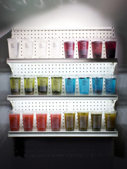 museumuesum:  Josh Kline Cafe Gratitude, 2012 mixed media, 38 x 32 x 12 inches top row: clear purell, vodka, lemon, proactiv, neosporin, water; dreamcatcher, acidophilus, blueberries, toms of maine, almond milk, quinoa, ginger agave middle row: venice