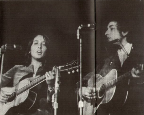 bobdylan-n-jonimitchell:  A rare shot of Joan Baez and Bob Dylan performing in the early half of 1965.