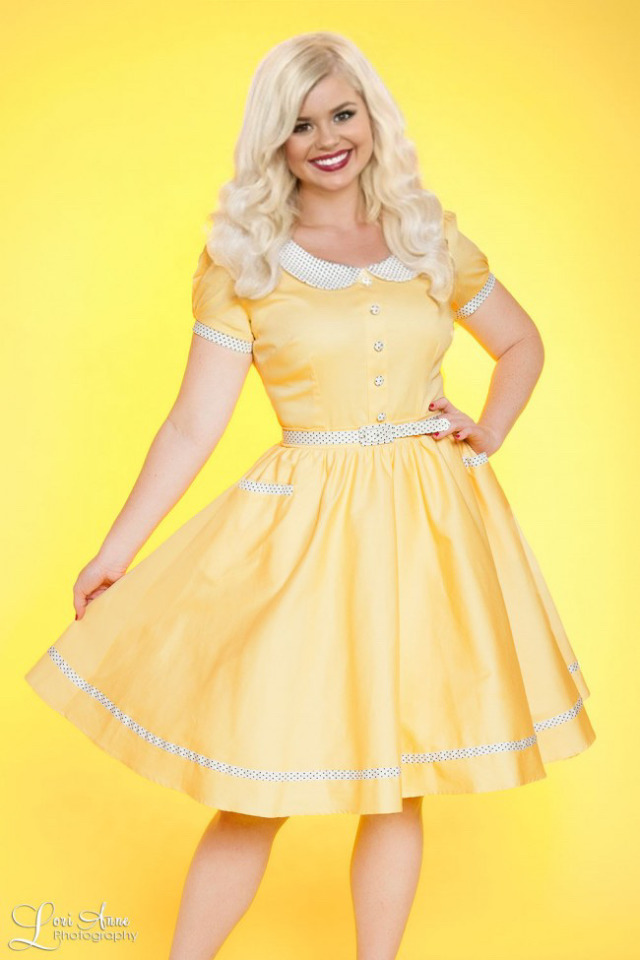 vintage housewife in yellow dress