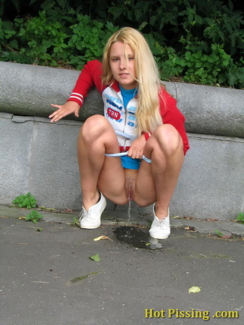 Cute blonde outdoors pees