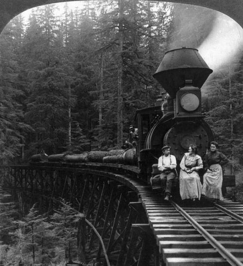 Porn Pics back-then:  Riding the logging train. 1906