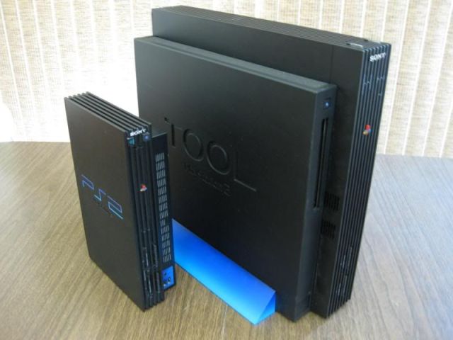 Retail PS2 next to a PS2 Dev Tool