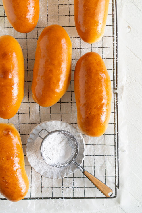 sweetoothgirl:  baked cream buns with vanilla bean cream and jam