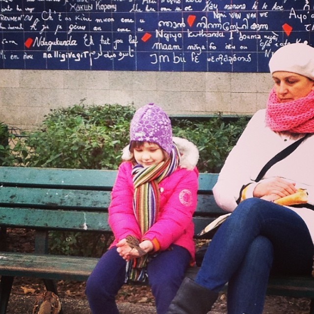 Feeding the birds 🐦🍞 (at Le Mur des “Je t’aime”)