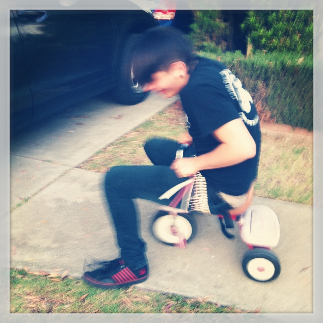 He was way too excited to ride my nieces tricycle. And also way too big to ride my