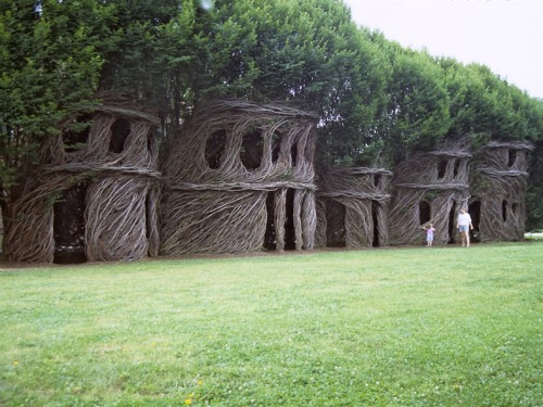 vvolare:  North Carolina-based sculptor Patrick Dougherty weaves dreamlike sculptures out of woods, twigs, vines, and any such natural tree-derived materials available to him. 