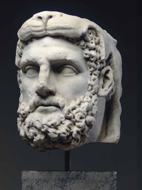 A roman over-lifesized marble head of Hercules. Flavian period, circa 69-98 A.D. Source : Christies.