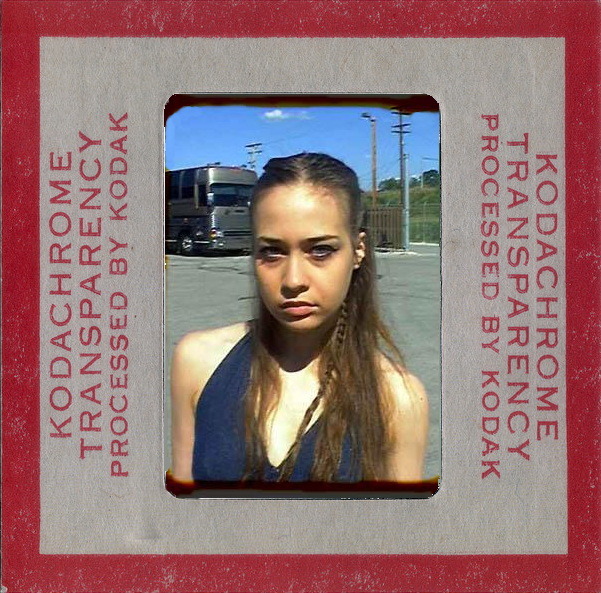 Fiona Apple with her tour bus at a truck stop in 1997