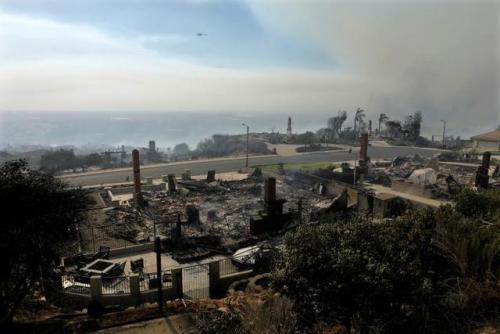 Southern California residents face growing uncertainty as several fast-moving wildfires continue to 